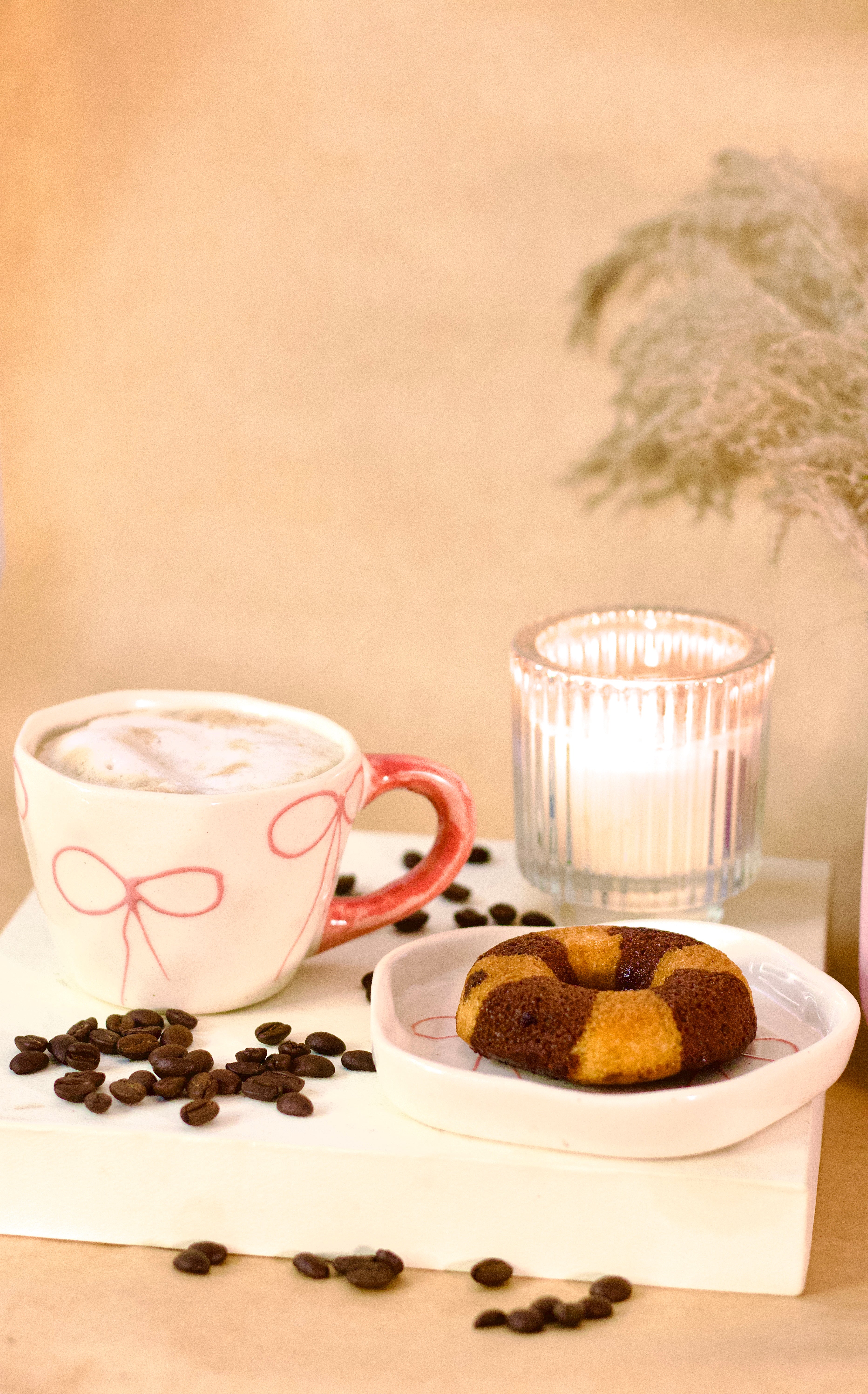 À La Bow ceramic cup and saucer set with delicate bow detail and soft blush finish by KLAEORA