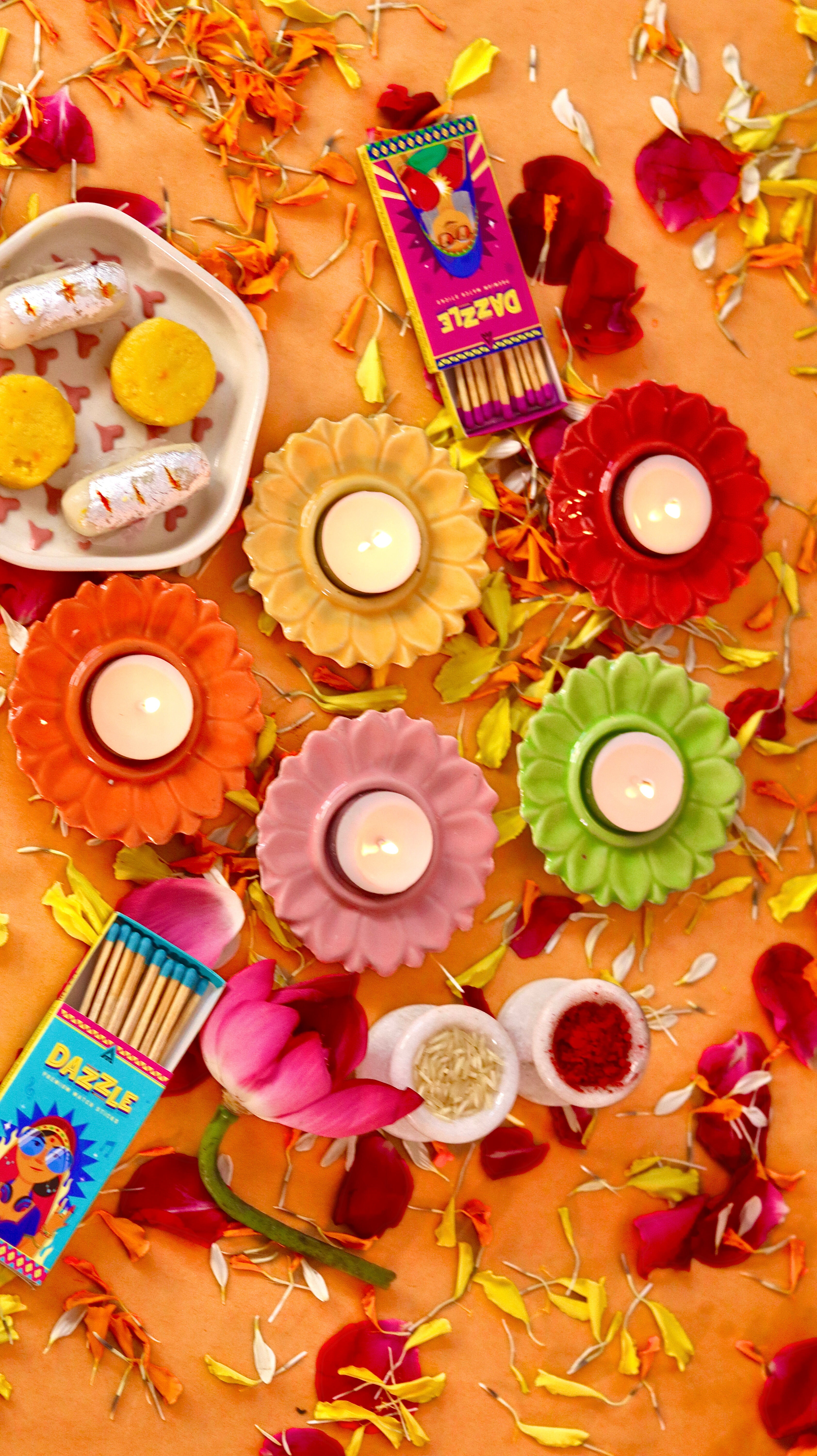 Bloomika flower-shaped T-light candle holder /diyas in vibrant festive colors by KLAEORA