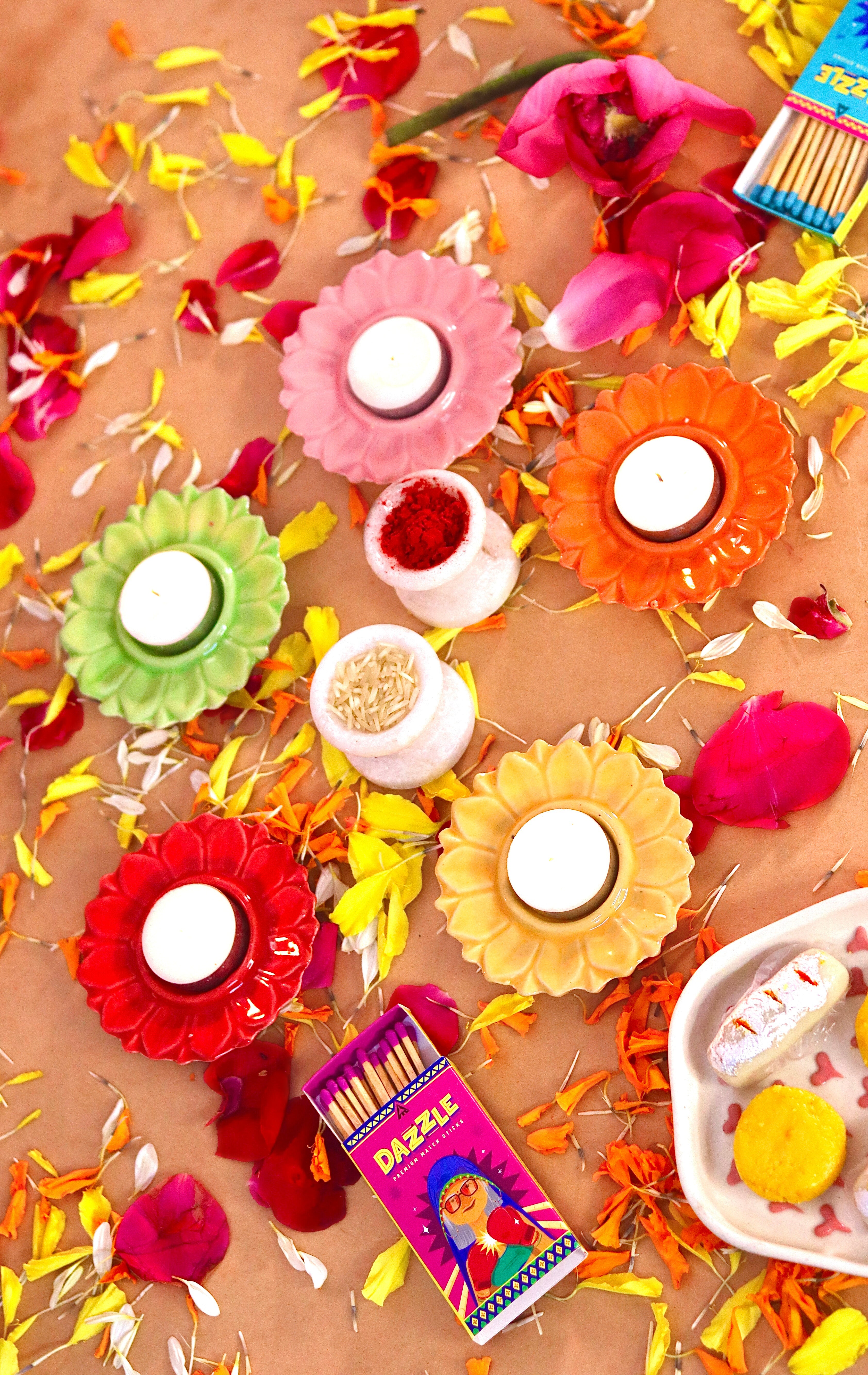 Bloomika flower-shaped T-light candle holder /diyas in vibrant festive colors by KLAEORA