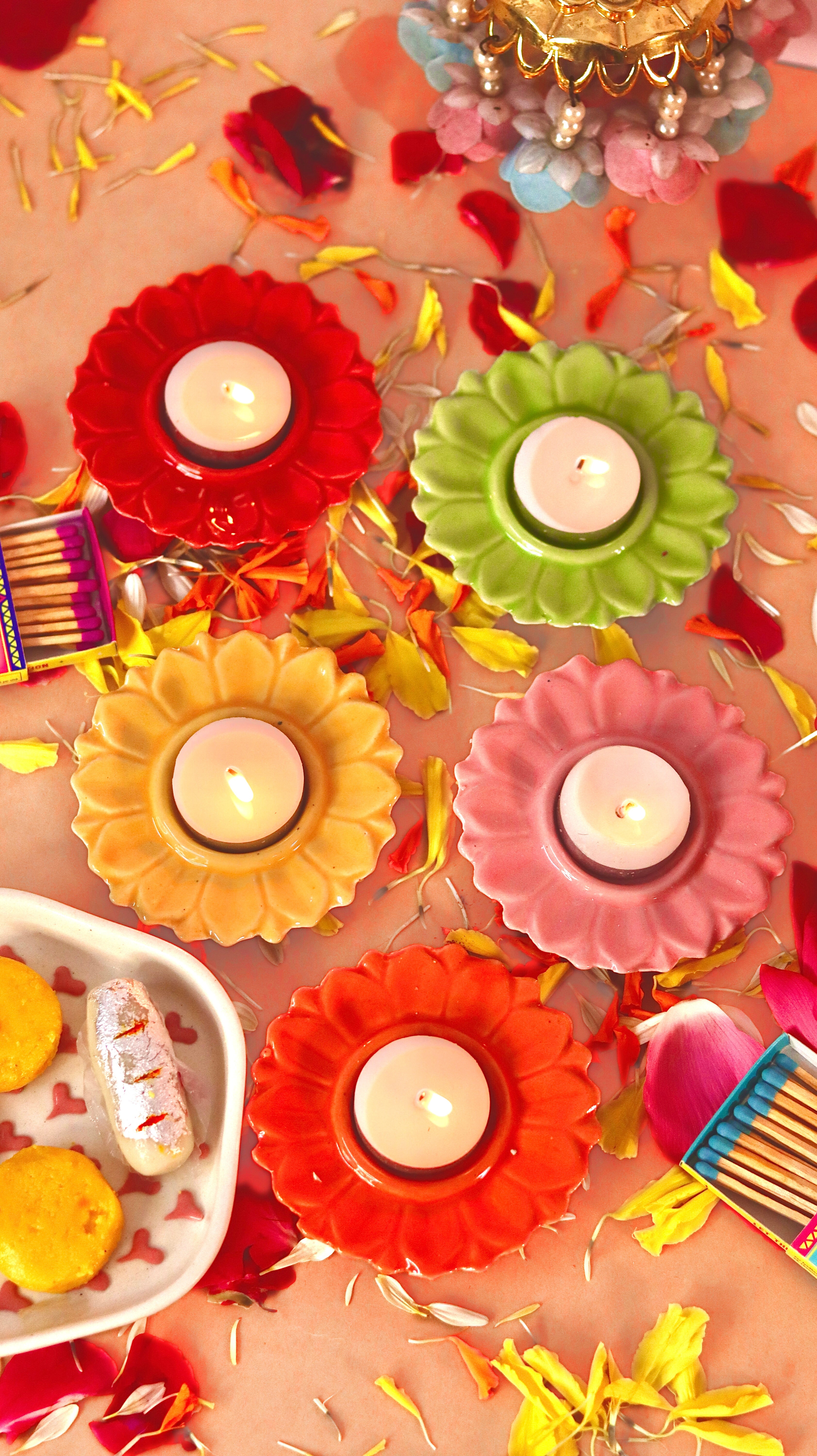 Bloomika flower-shaped T-light candle holder /diyas in vibrant festive colors by KLAEORA