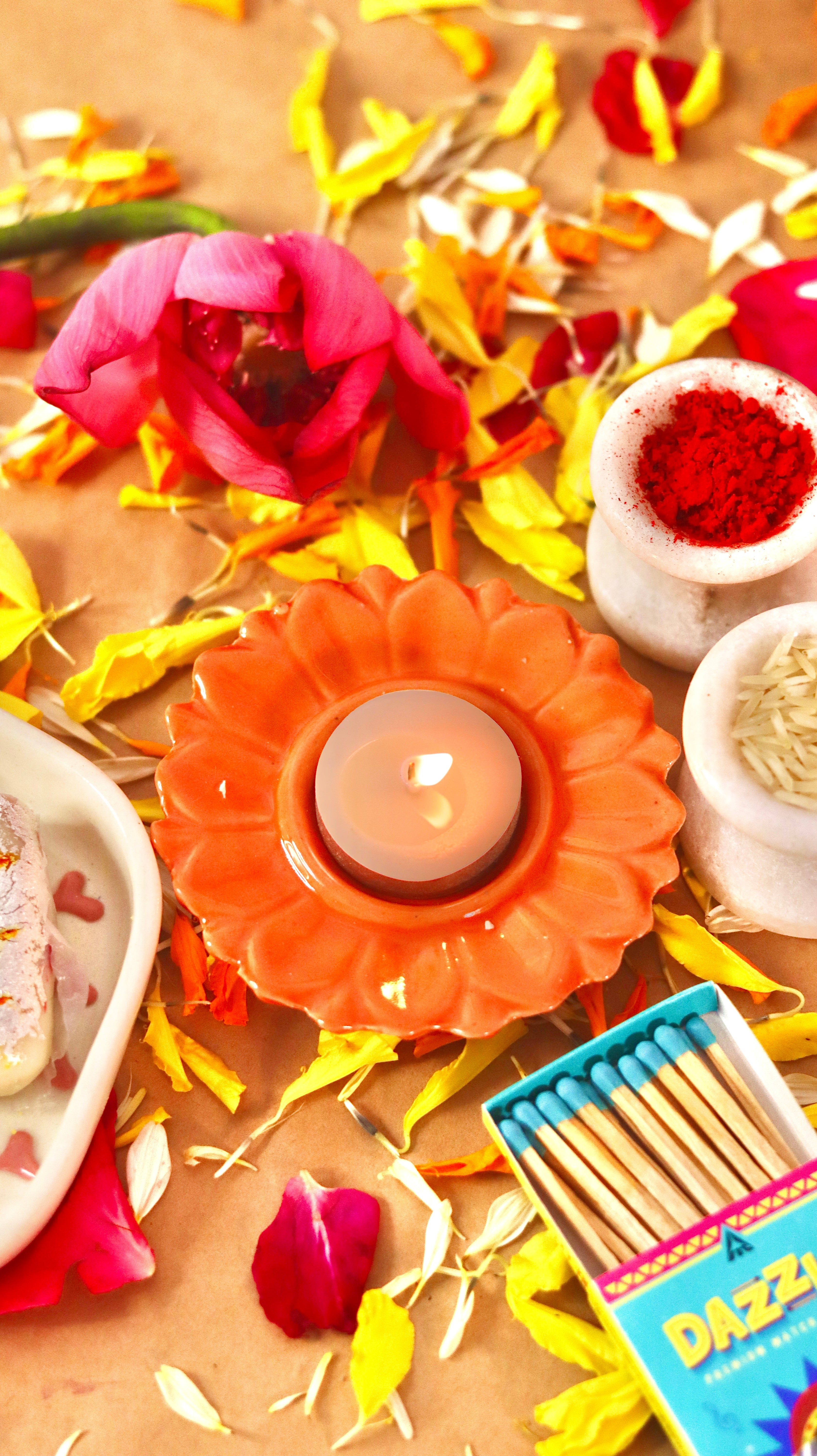 Bloomika flower-shaped T-light candle holder /diyas in vibrant festive colors by KLAEORA