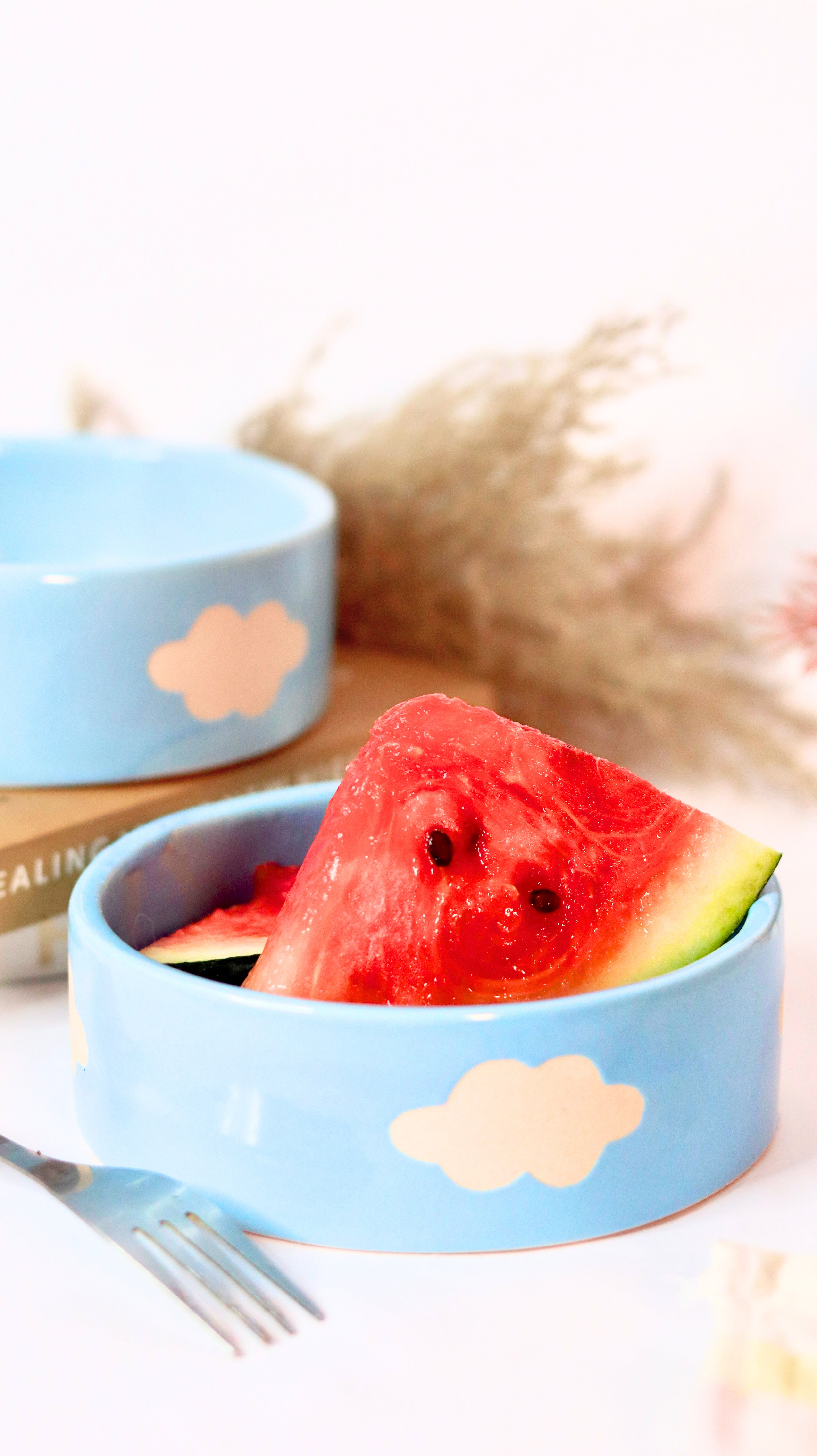 Cloud Munch Bowl by KLAEORA – hand-painted blue ceramic snack bowl with white cloud design in pastel hues