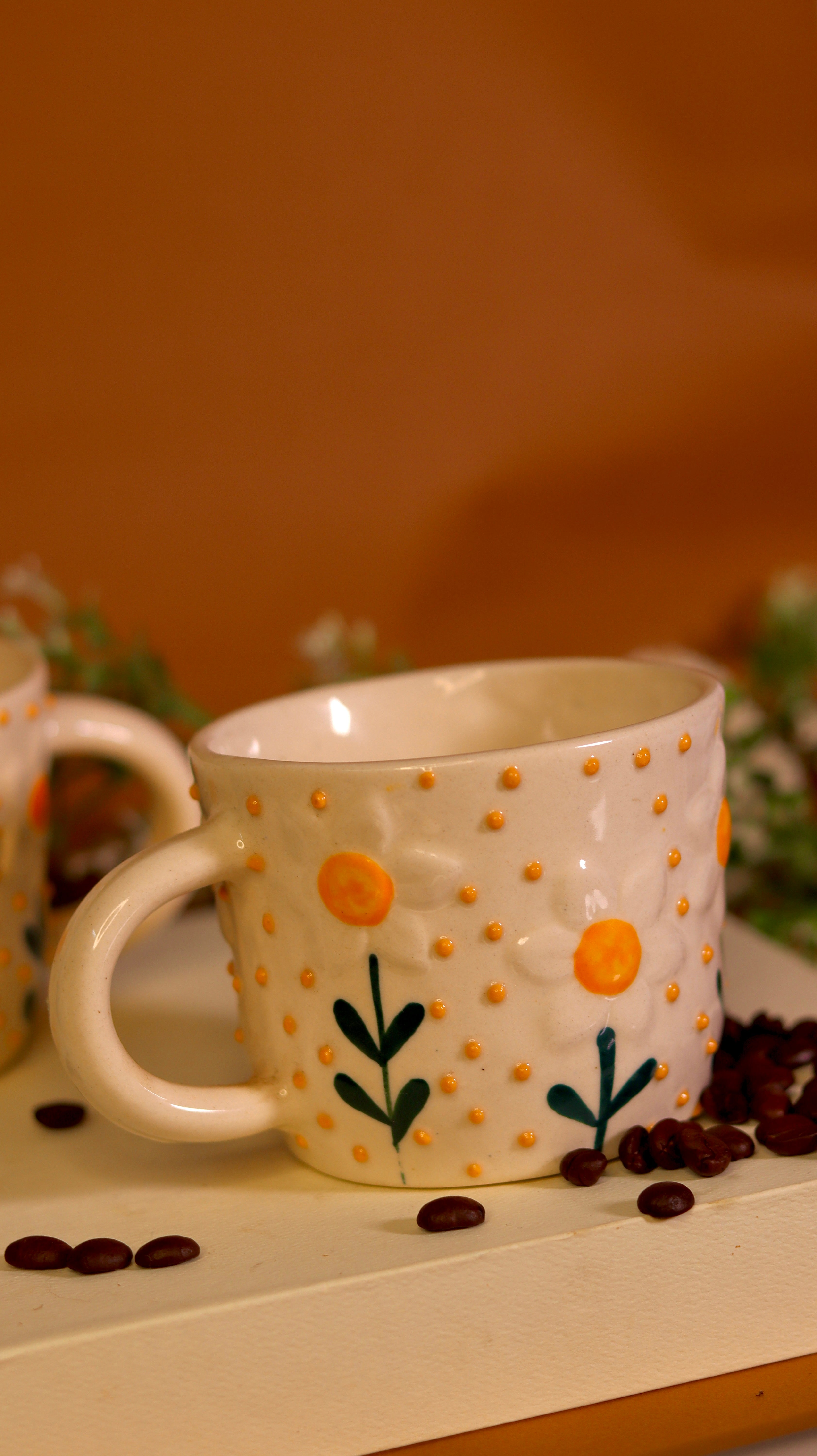 Golden Bloom ceramic mug with hand-painted floral design and golden accents by KLAEORA