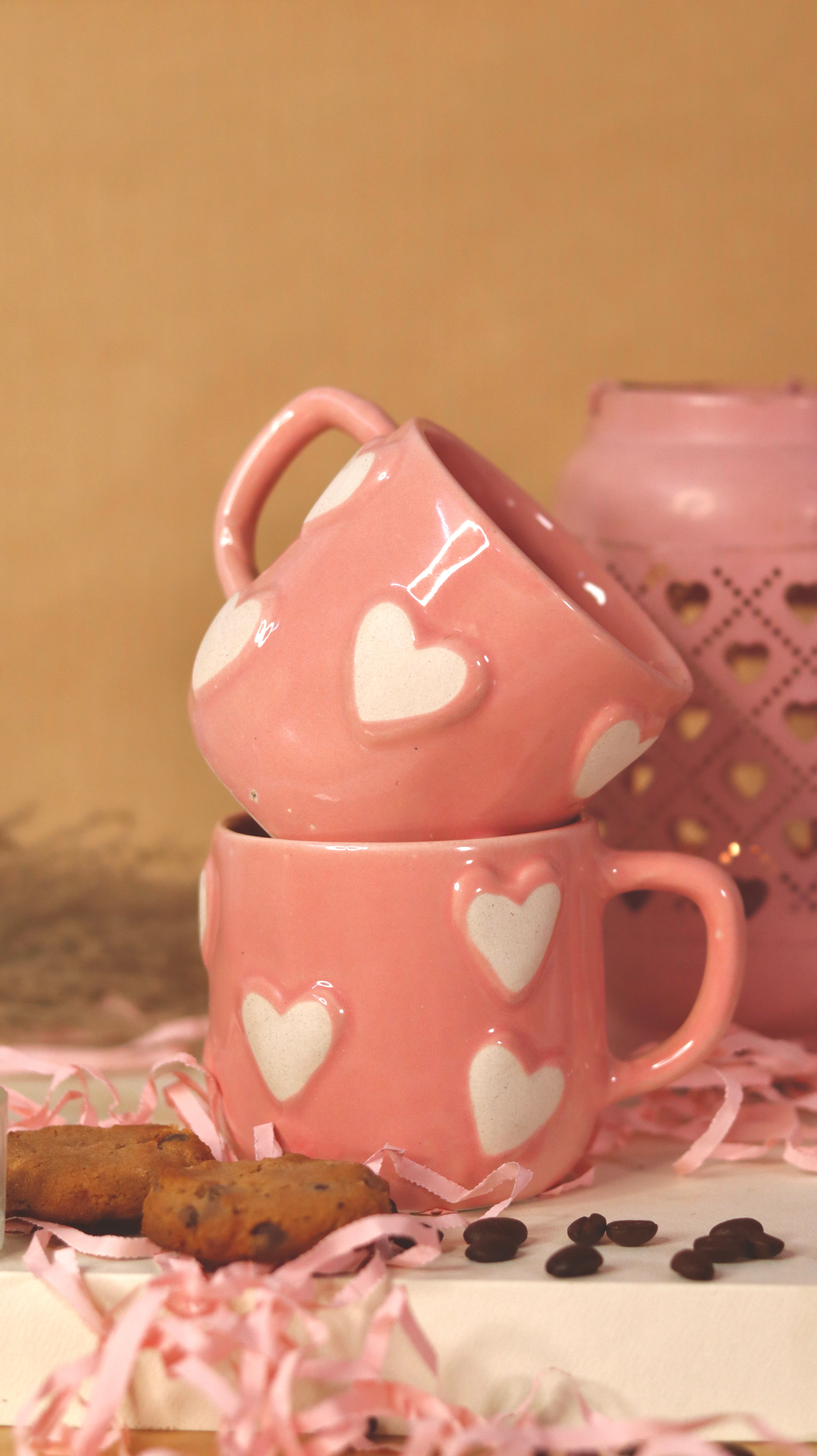 Pink Love Pop ceramic mug with embossed white heart design on glossy blush base by KLAEORA