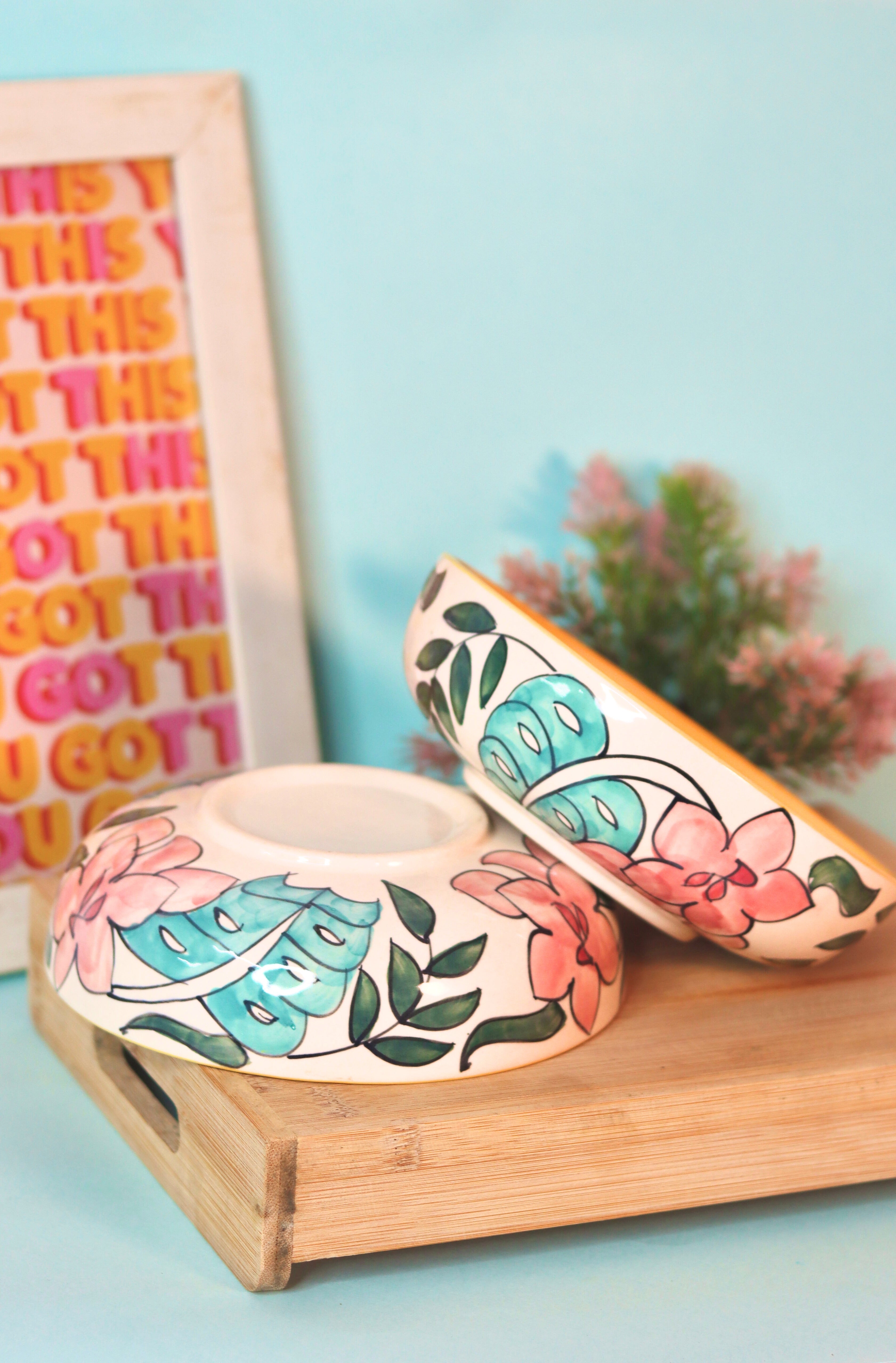 Tropicana Bloom Bowl by KLAEORA – hand-painted ceramic bowl with floral and leaf design in orange and tropical tones