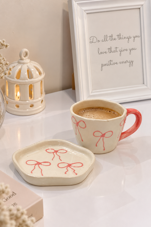 À La Bow Ceramic Cup & Saucer Set