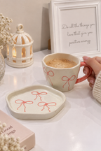 À La Bow Ceramic Cup & Saucer Set