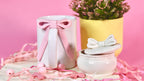  ceramic mug with pink bows on a pink background
