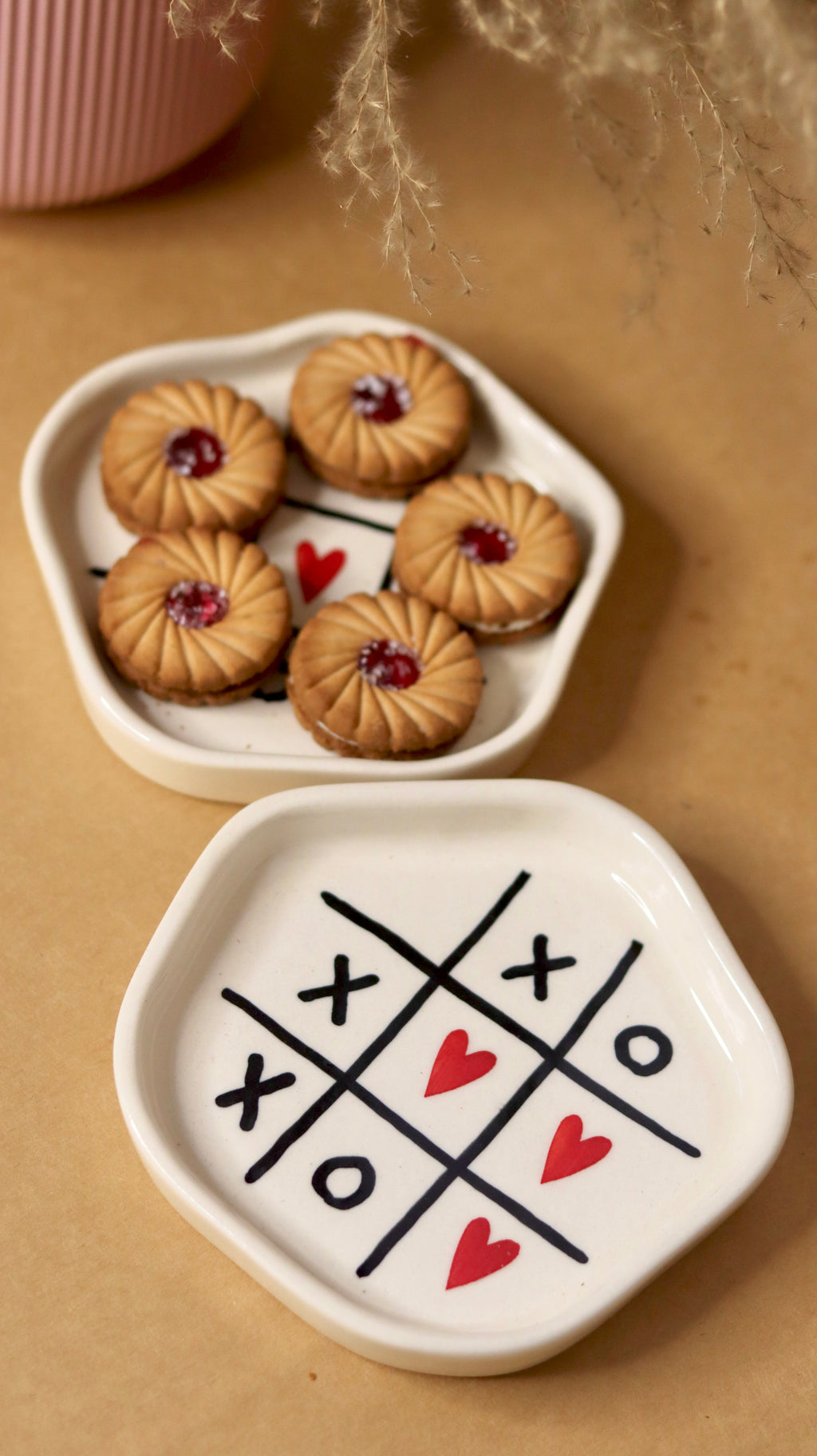 White ceramic tic tac toe heart plate 