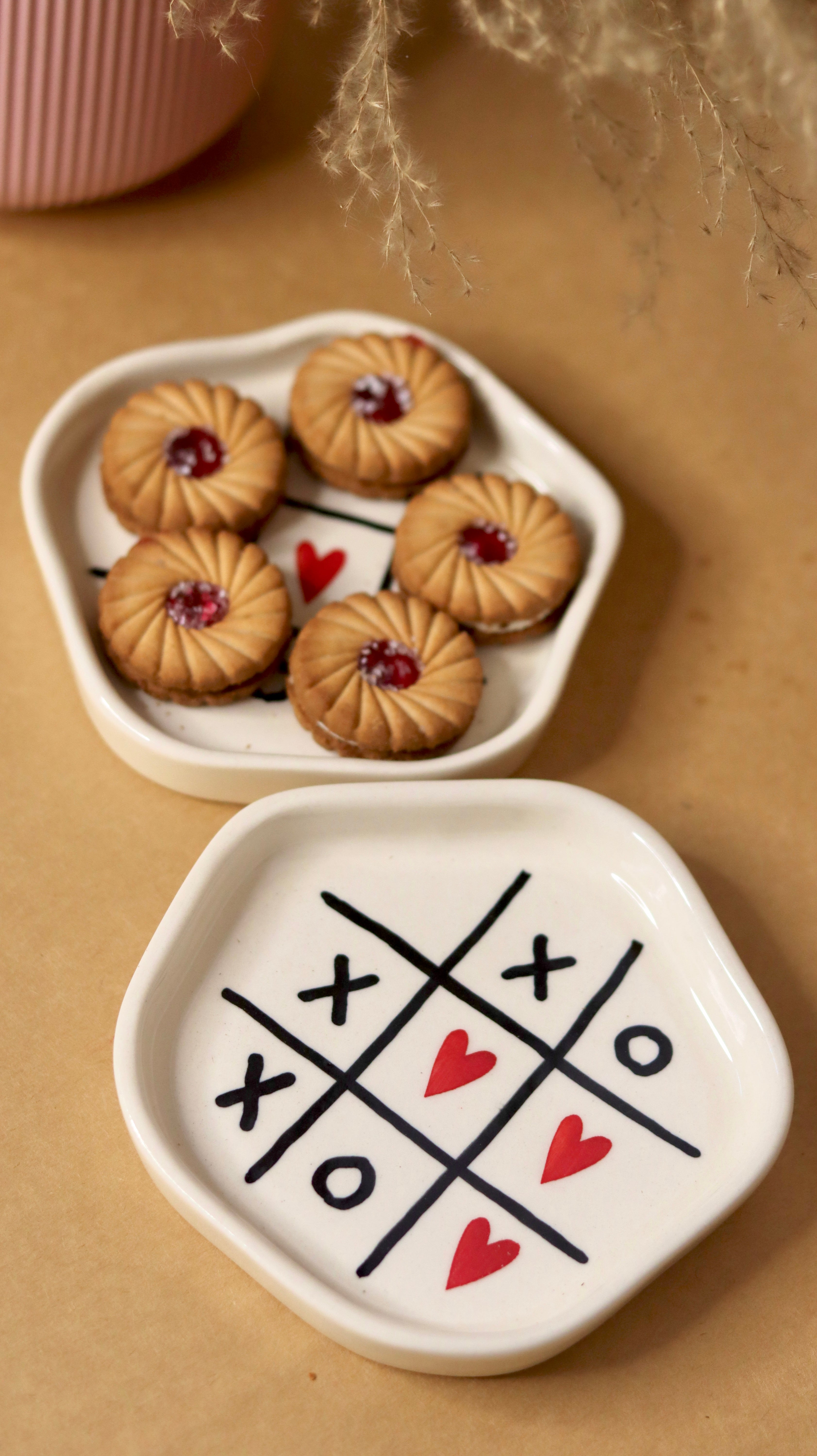 White ceramic tic tac toe heart plate 