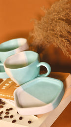 Blue and white ceramic cup and saucer

