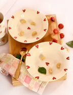 Sweetheart Pasta Plate in glossy white ceramic with embossed heart design by KLAEORA